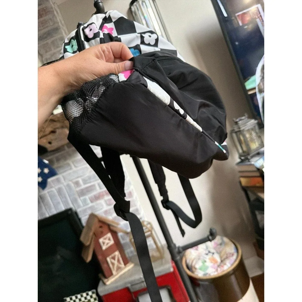 Claire's Checkered Daisy Small Backpack black-and-white checkerboard